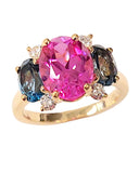 Rose Gold Bezel Set Dark Blue Topaz with Surrounding Pink Sapphire Ring