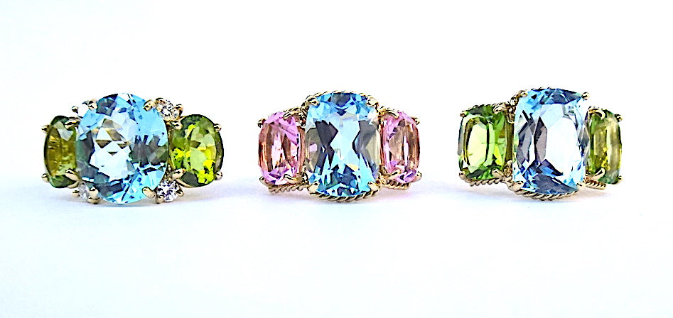 Elegant Three-Stone Ring with Gold Rope Twist Border with Blue Topaz and Pink Topaz