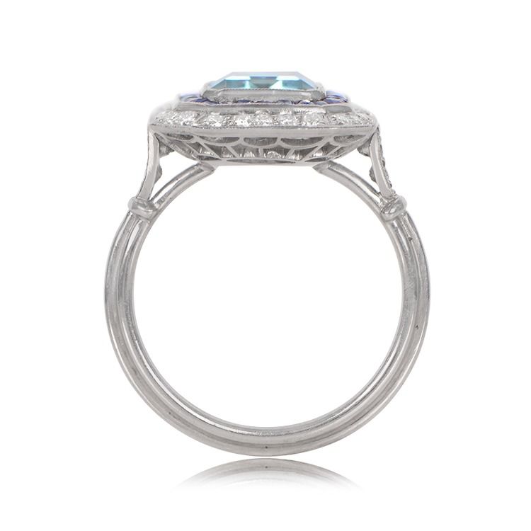 Platinum European cut Diamond and Emerald Halo set Ring