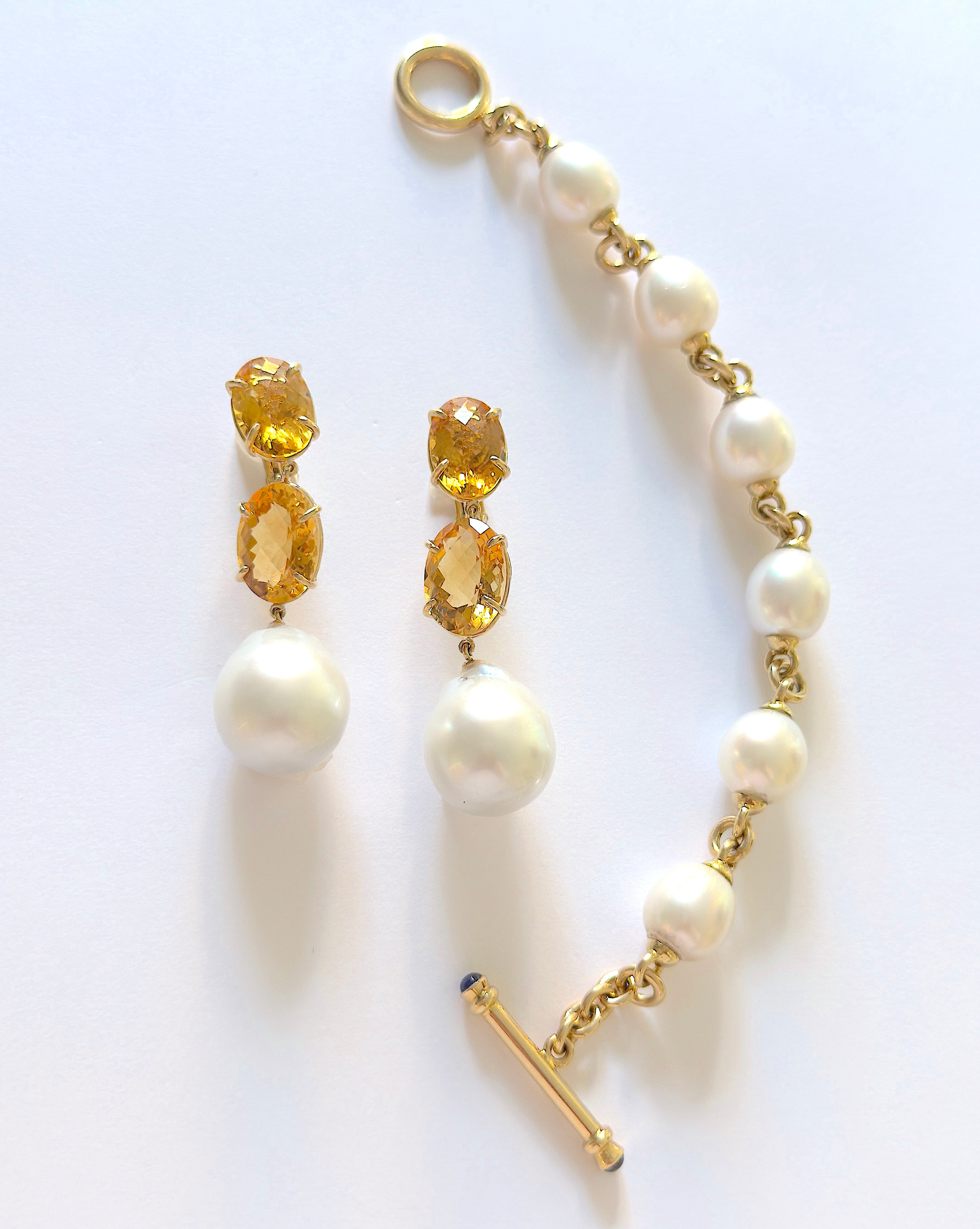 Elegant Three-Stone Drop Earring with Blue Topaz and Baroque Pearl