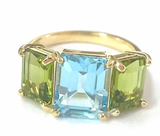 Rose Gold Bezel Set Dark Blue Topaz with Surrounding Pink Sapphire Ring