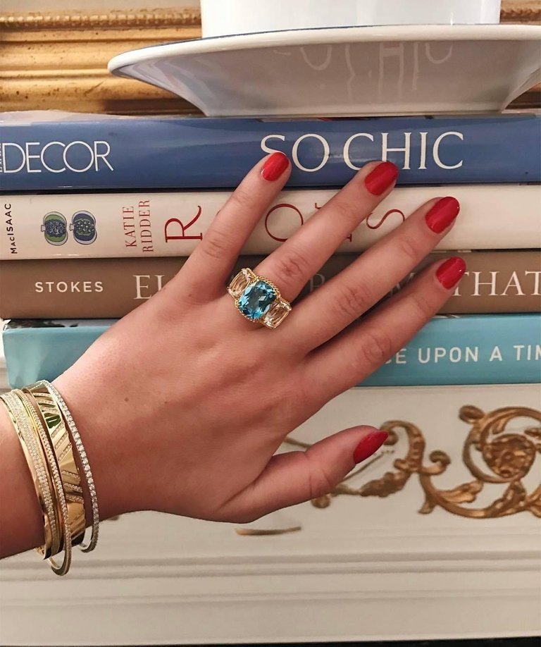 Elegant Three-Stone Ring with Gold Rope Twist Border with Blue Topaz and Pink Topaz