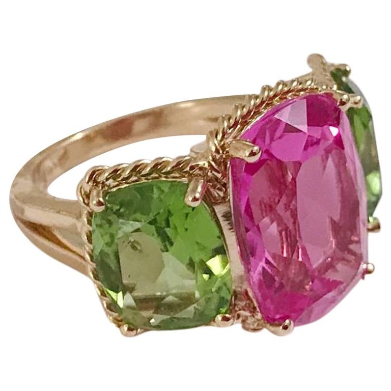 Elegant Three-Stone Ring with Gold Rope Twist Border with Blue Topaz and Pink Topaz
