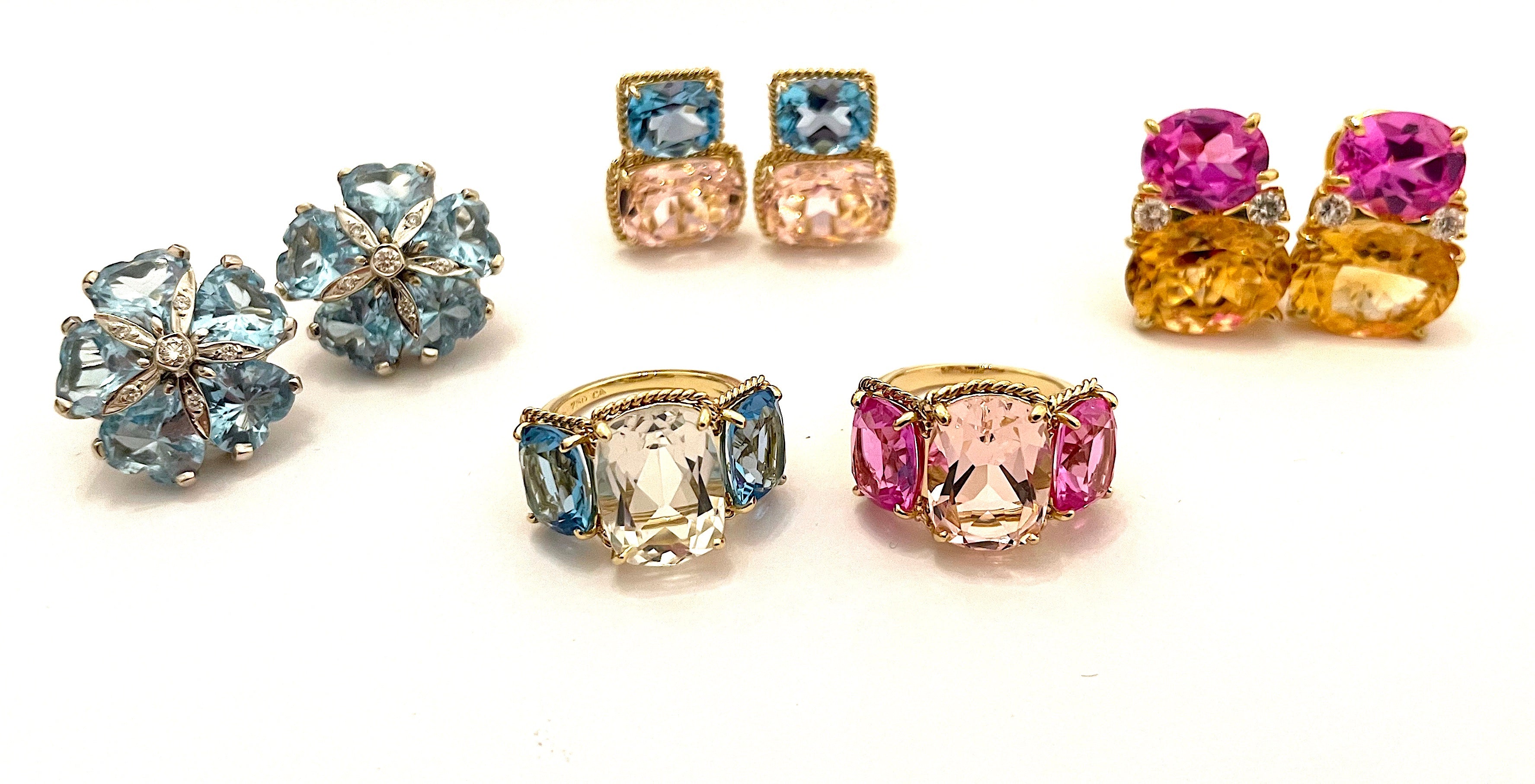Elegant Three-Stone Ring with Gold Rope Twist Border with Blue Topaz and Pink Topaz