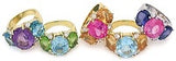 Elegant Three-Stone Ring with Gold Rope Twist Border with Blue Topaz and Peridot